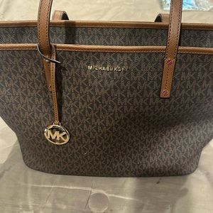 Michael Kors-Just like new purchased worn twice.